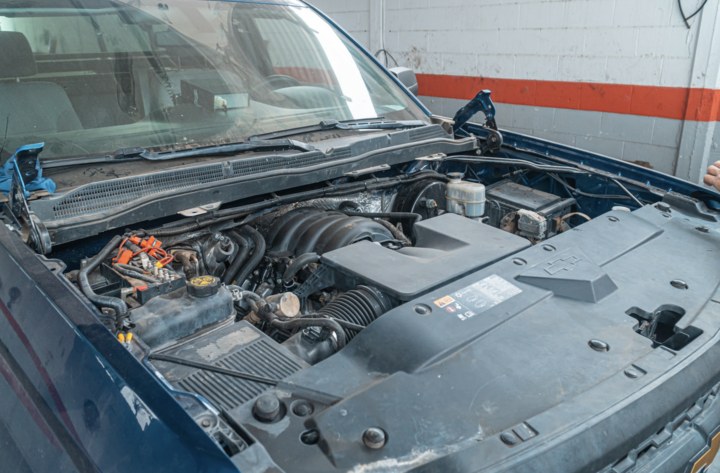 Midland mobile mechanic working on a pickup engine